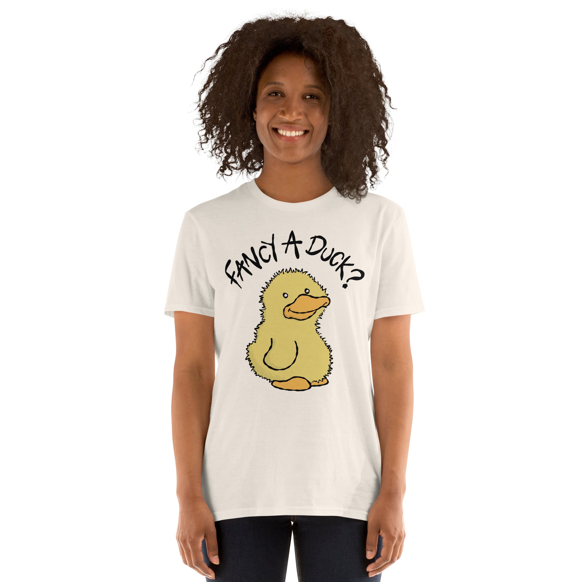 Person wearing a white t-shirt with a cartoon duck and text FANCY A DUCK on a white background