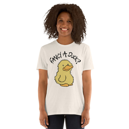 Person wearing a white t-shirt with a cartoon duck and text FANCY A DUCK on a white background