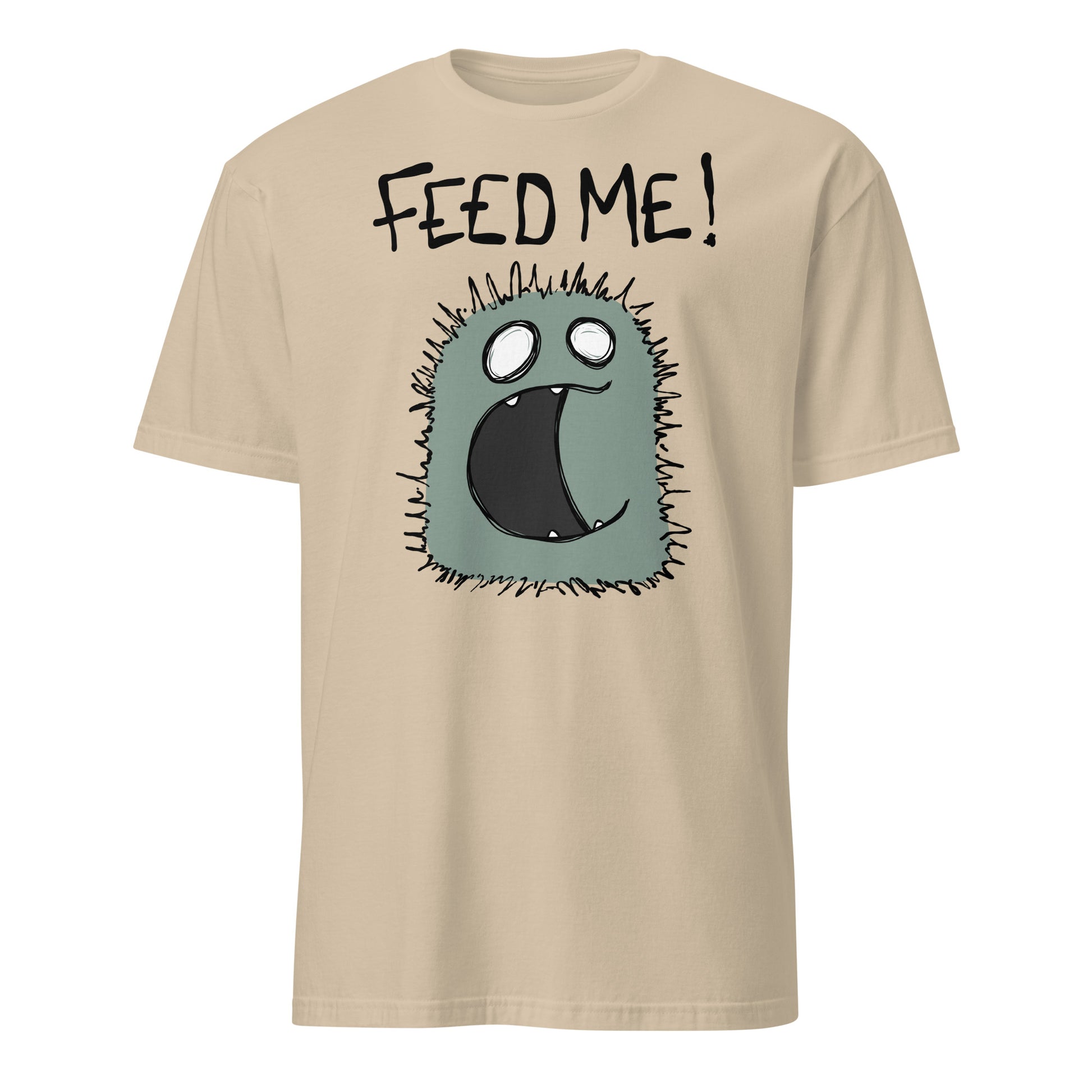 Beige t-shirt with cartoon character and 'FEED ME!' text on a white background