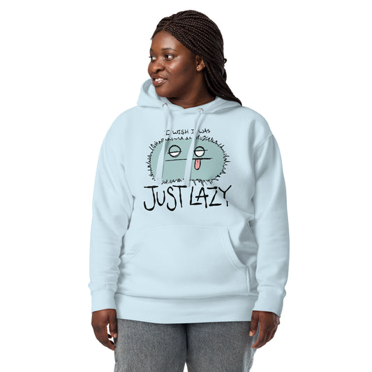 Person wearing a light blue hoodie with a charcter design and text I WISH I WAS JUST LAZY on a white background