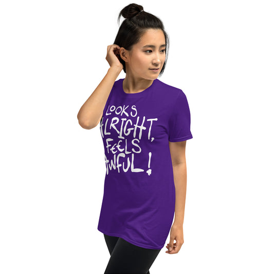 Person wearing a purple t-shirt with text LOOKS ALRIGHT FELLS AWFUL on a white background