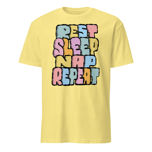 Yellow t-shirt with colorful text 'REST SLEEP NAP REPEAT' on a white background