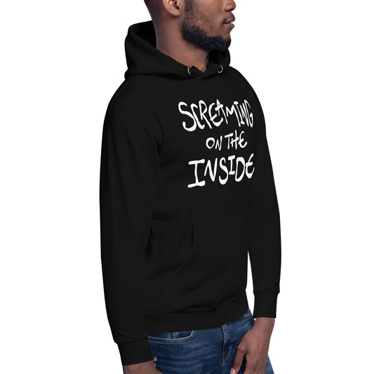 Person wearing a black hoodie with 'Screaming on the Inside' text on a white background