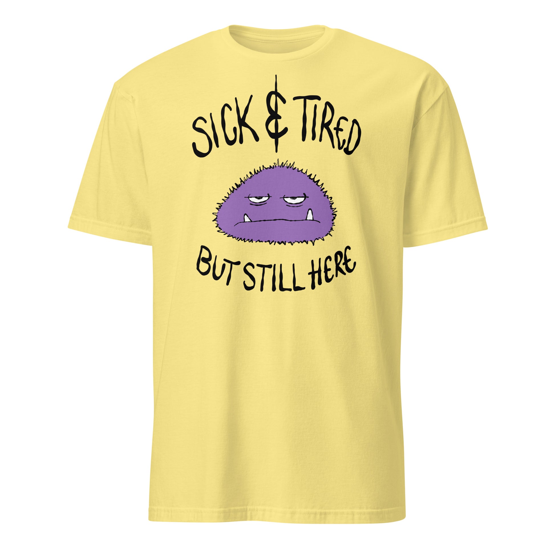 Cornsilk yellow t-shirt with a purple cartoon character and text sick and tired but still here on a white background