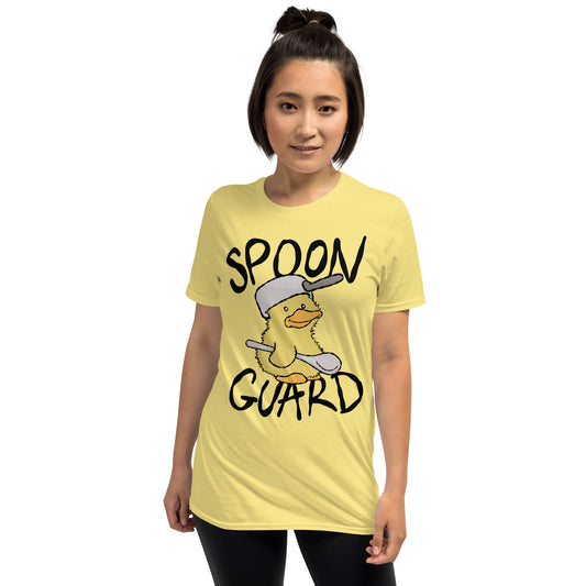 Person wearing a yellow t-shirt with a cartoon duck and 'Spoon Guard' text on a white background