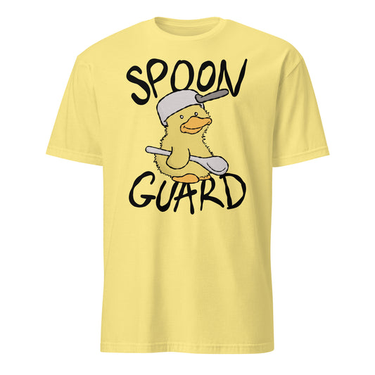 Yellow t-shirt with a cartoon duck wearing a baseball cap and holding a spoon, labelled 'Spoon Guard' on a white background.