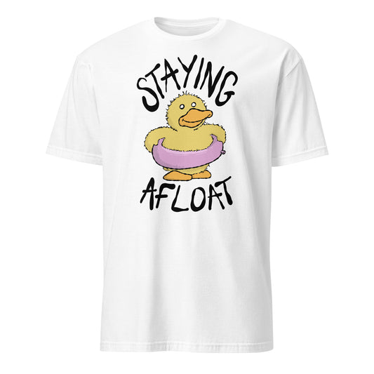 White t-shirt with a cartoon duck and text 'STAYING AFLOAT' on a white background