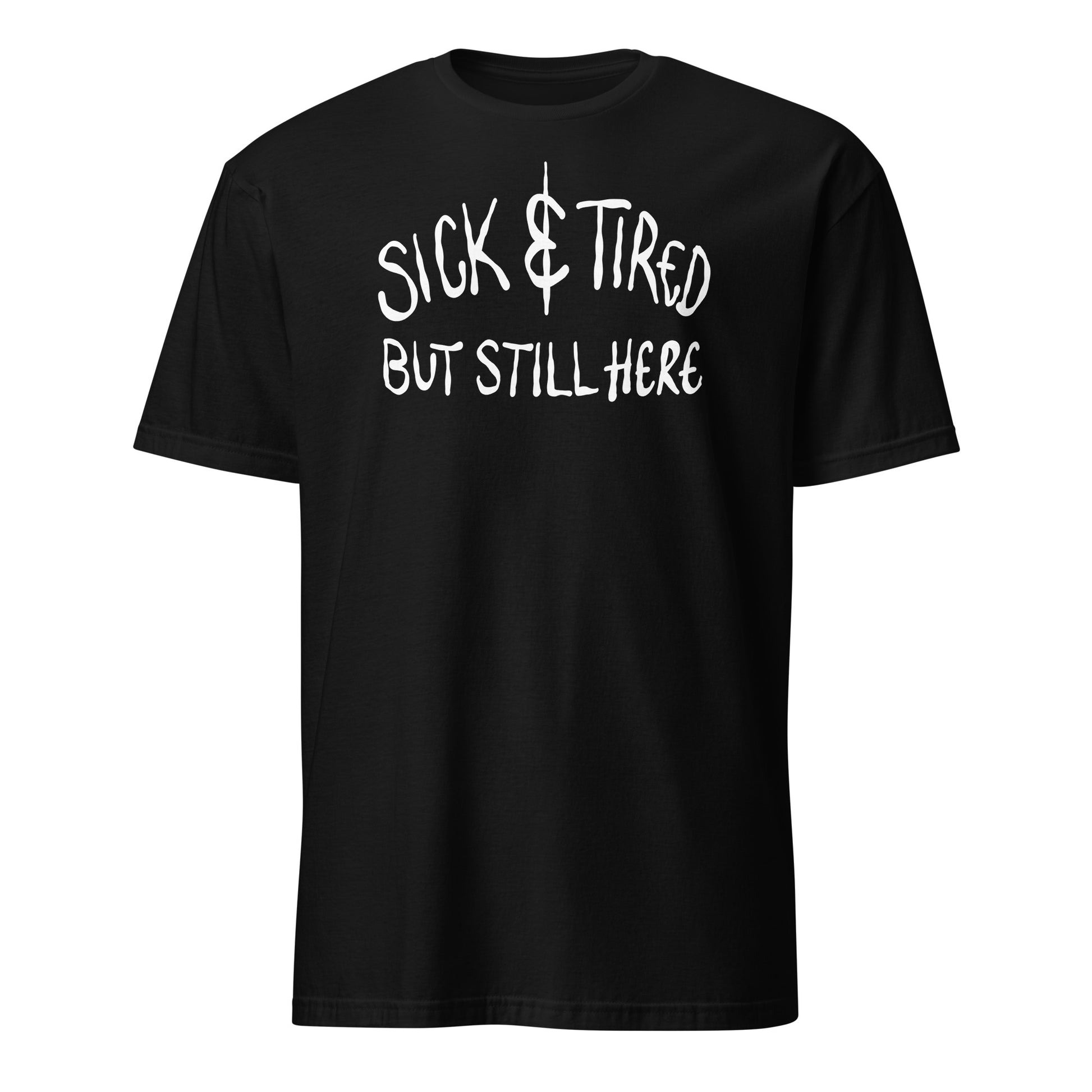 Black t-shirt with white text 'SICK & TIRED BUT STILL HERE' on a white background